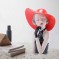 Decorative art craft for a modern girl with a hat to decorate home and office