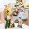 Decorative art-craft of sun flower girl with flower stand to decorate homes and shops