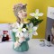 Decorative art-craft of girl with flower stand to decorate homes and shops